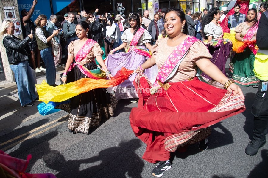 Performers take part in a parade as part of the Annual Brick lane Festival 2026 in Brick Lane, London, England, UK on Sunday 20 September, 2026