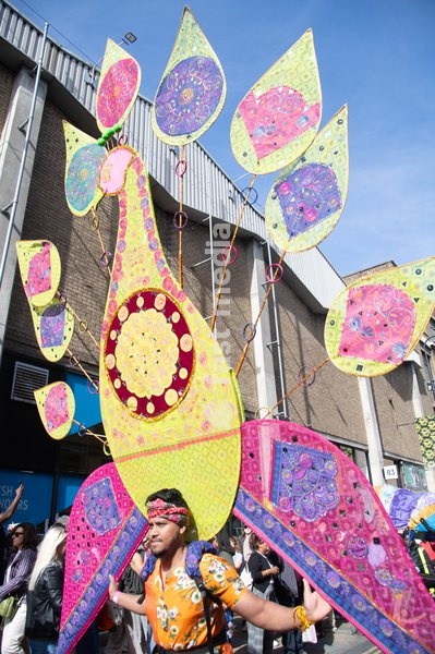 Performers take part in a parade as part of the Annual Brick lane Festival 2026 in Brick Lane, London, England, UK on Sunday 20 September, 2026