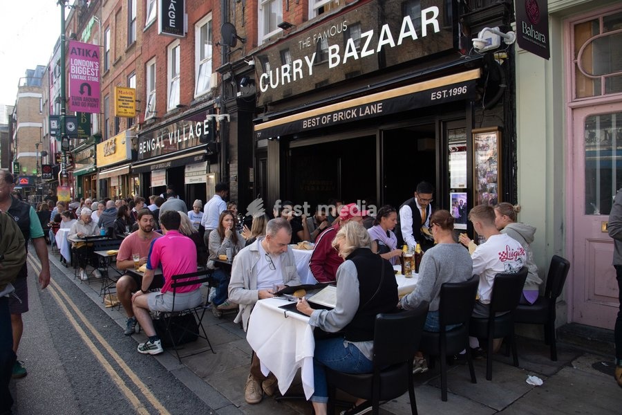 A general view of people eating out at the Annual Brick lane Festival 2026 in Brick Lane, London, England, UK on Sunday 20 September, 2026