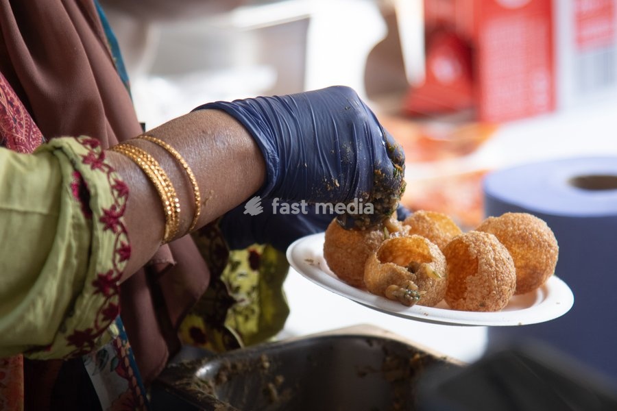 Street vendors make sev puri at the Annual Brick lane Festival 2026 in Brick Lane, London, England, UK on Sunday 20 September, 2026
