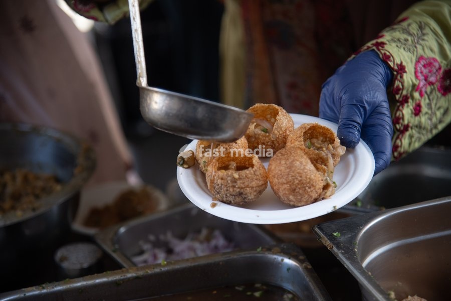 Street vendors make sev puri at the Annual Brick lane Festival 2026 in Brick Lane, London, England, UK on Sunday 20 September, 2026