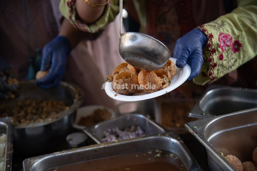 Street vendors make sev puri at the Annual Brick lane Festival 2026 in Brick Lane, London, England, UK on Sunday 20 September, 2026