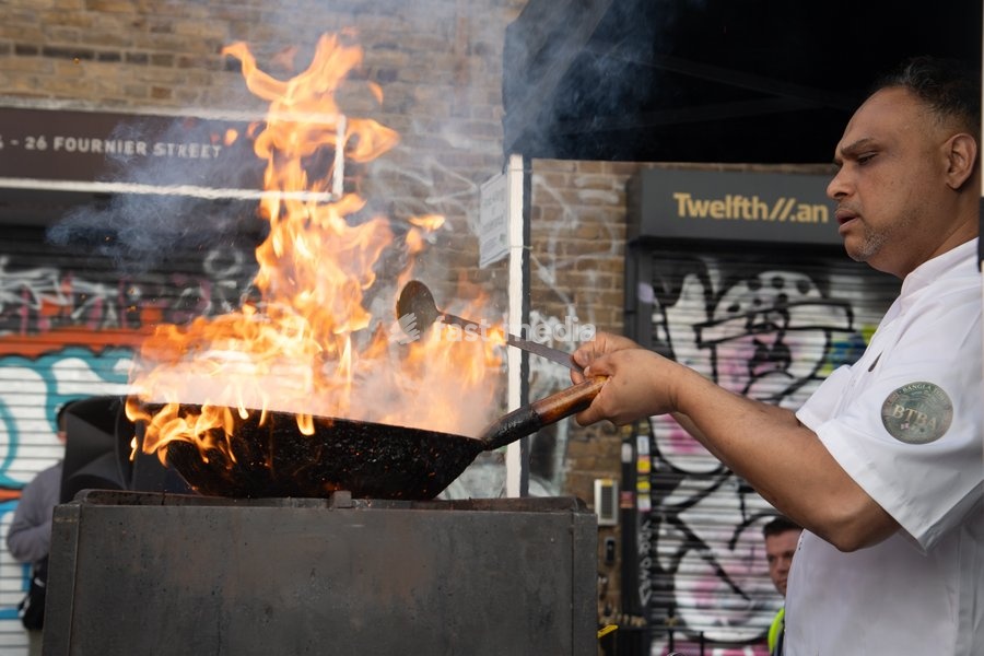 Chef Atik Rahman makes gunpowder curry at the Annual Brick lane Festival 2026 in Brick Lane, London, England, UK on Sunday 20 September, 2026