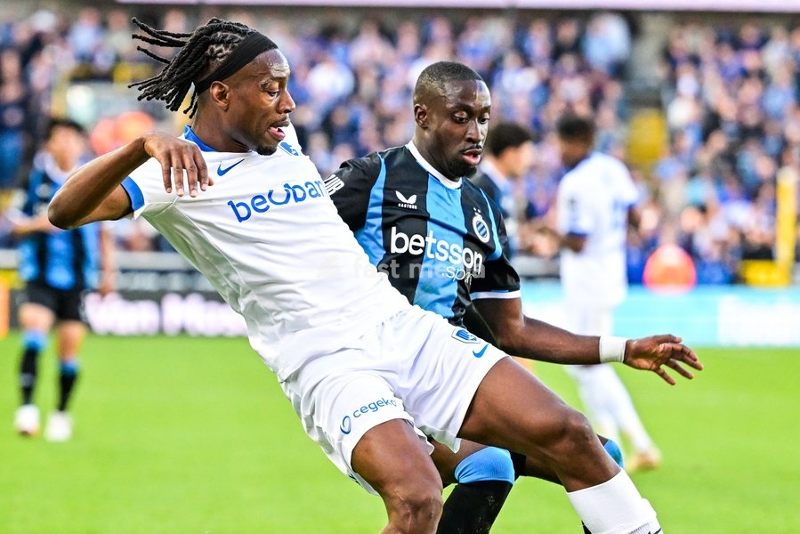 Genk's Joris Kayembe and Club's Carlos Forbs fight for the ball during a soccer match between Club Brugge KV and KRC Genk, Sunday 20 September 2026 in Brugge, on day 7 of the 2026-2027 'Jupiler Pro League' first division of the Belgian championship