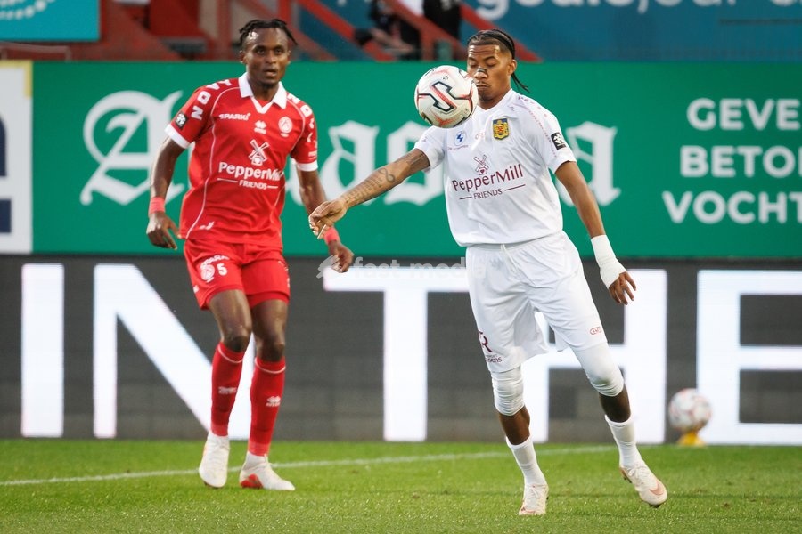 Kortrijk's James Ndjeungoue and Beveren's Jearl Margaritha fight for the ball during a soccer match between KV Kortrijk and SK Beveren, Sunday 20 September 2026 in Kortrijk, on day 7 of the 2026-2027 'Jupiler Pro League' first division of the Belgian championship