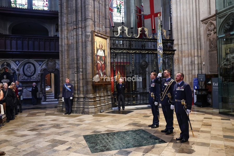 Members of the military (R) stand by the memorial to Britain's former prime minister Winston Churchill as they attend a 'Service of Thanksgiving and Rededication' to mark the 86th anniversary of Battle of Britain, at Westminster Abbey in central London on September 20, 2026