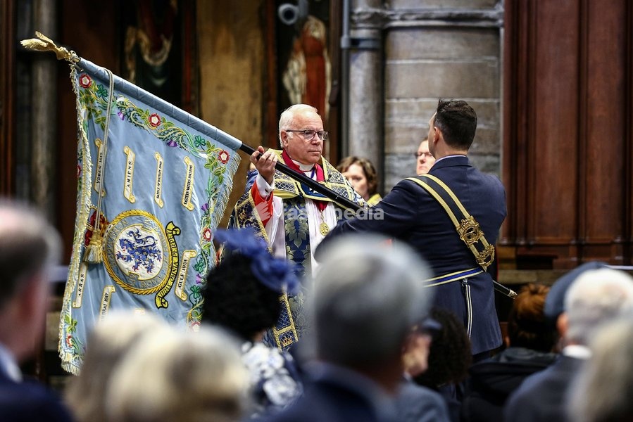 Attendees look on as the Royal Air Force colours are handed over during a 'Service of Thanksgiving and Rededication' to mark the 86th anniversary of Battle of Britain, at Westminster Abbey in central London on September 20, 2026