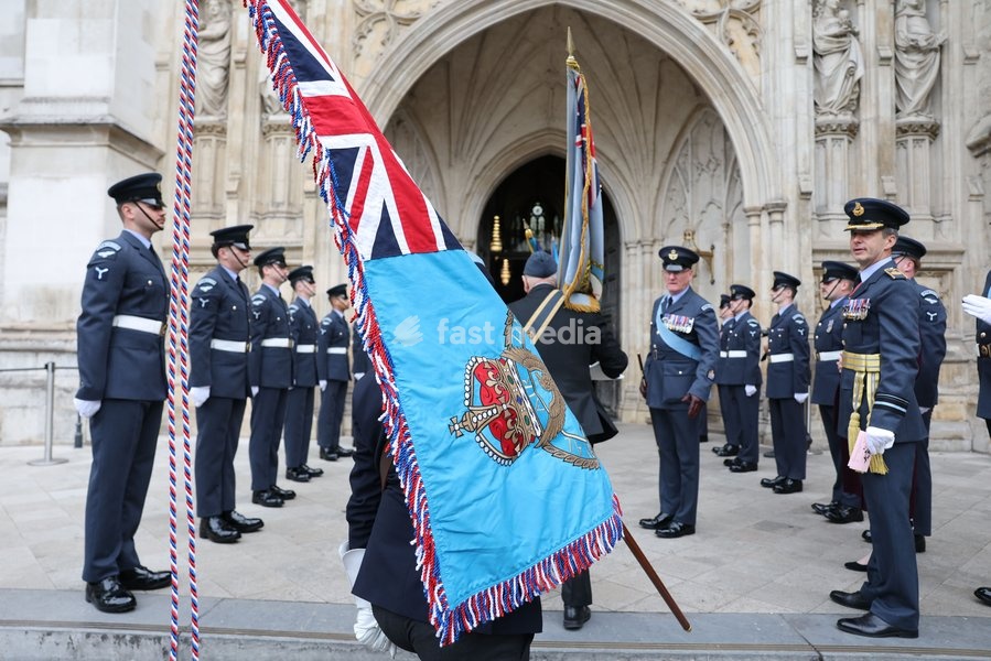 Raf veteran flag bearers stand march into Westminster Abbey as they take part in the annual service of thanksgiving and rededication service on Battle of Britain Sunday the annual service to remember the RAF fighter pilots who fought in the battle in 1940