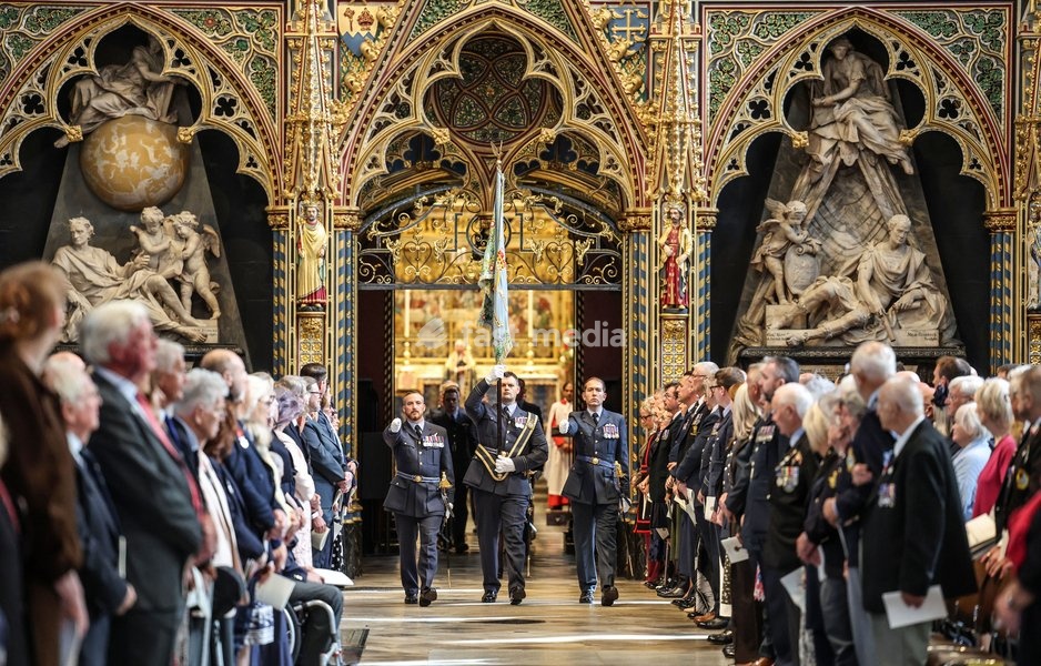 Raf standard bearers carry the flag of 54 squadron RAF through Westminster Abbey as they take part in the annual service of thanksgiving and rededication service on Battle of Britain Sunday the annual service to remember the RAF fighter pilots who fought in the battle in 1940. 54 squadron was one…