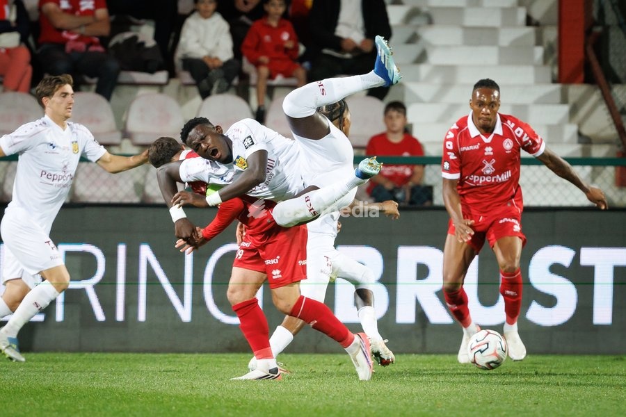 Kortrijk's Brecht Dejaegere and Beveren's Cheikh Conde fight for the ball during a soccer match between KV Kortrijk and SK Beveren, Sunday 20 September 2026 in Kortrijk, on day 7 of the 2026-2027 'Jupiler Pro League' first division of the Belgian championship
