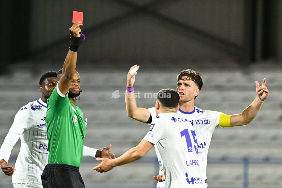 Patro Eisden's Sami Lahssaini receives a red card from the referee during a soccer match between FCV Dender EH and Patro Eisden Maasmechelen, Sunday 20 September 2026 in Denderleeuw, on day 6 of the 2026-2027 'Challenger Pro League' 1B second division of the Belgian championship