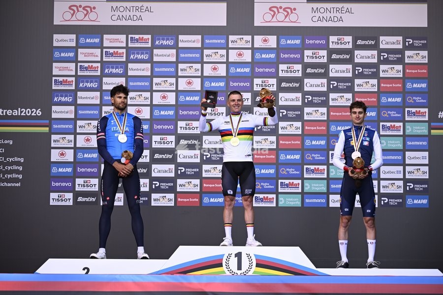 L-R, silver medalist, Italy's Filippo Ganna; winner world champion Belgium's Remco Evenepoel and bronze medalist France's Paul Seixas celebrate on the podium of the men's elite individual time trial race (39,2km) at the cycling UCI Road World Championship, in Montreal, Canada, Sunday 20 September…