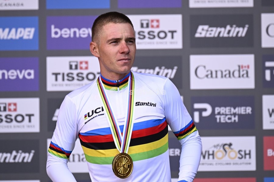 Winner Belgian Remco Evenepoel pictured wearing the world champion jersey on the podium of the men's elite individual time trial race (39,2km) at the cycling UCI Road World Championship, in Montreal, Canada, Sunday 20 September 2026