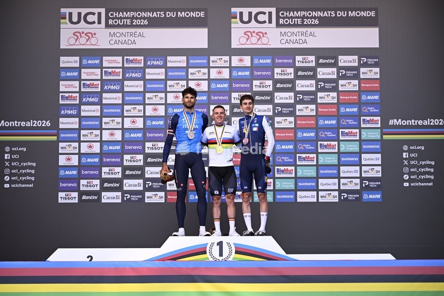 L-R, silver medalist, Italy's Filippo Ganna; winner world champion Belgium's Remco Evenepoel and bronze medalist France's Paul Seixas celebrate on the podium of the men's elite individual time trial race (39,2km) at the cycling UCI Road World Championship, in Montreal, Canada, Sunday 20 September…