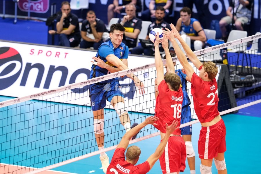 Giovanni Sanguinetti of the Italy (L), Simon Tabermann Uhrenholt of Denmark (C) and Mads Kyed Jensen of Denmark during the Italy vs Denmark match at Final Eight of the CEV Enel EuroVolley 2026 Men at PalaVela in Turin, Italy, on September 20, 2026. Italy wins the match against Denmark with a score…