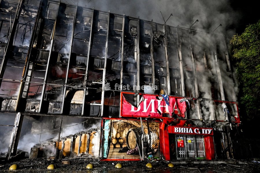Smoke rises from the Intrade shopping centre that caught fire due to an overnight Russian drone attack, Zaporizhzhia, Ukraine, September 21, 2026. On Monday night, Russian forces struck the southeastern city with strike UAVs and an FPV drone. The attack destroyed the shopping centre and damaged a…