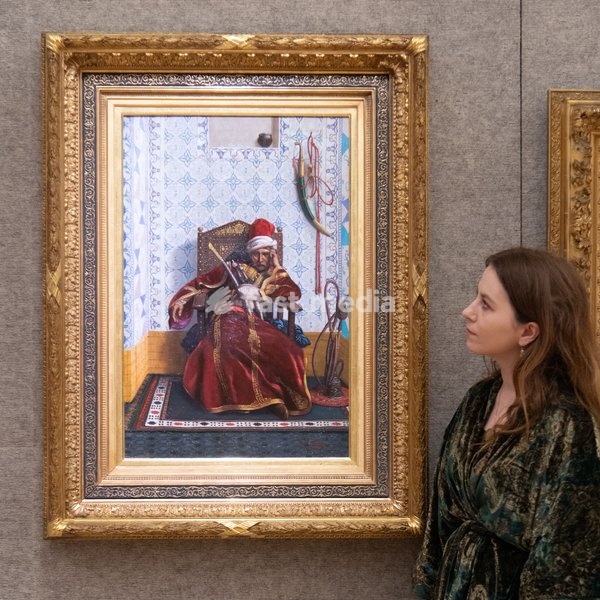 A staff member views 'Portrait of Markos Botsaris' by Fabio Fabbi (est. £30k - £50k) which is to go on auction at Bonhams' 19th Century and British Impressionist Art Sale on 23rd September 2026 at Bonhams in London, England, UK on Monday 21 September, 2026