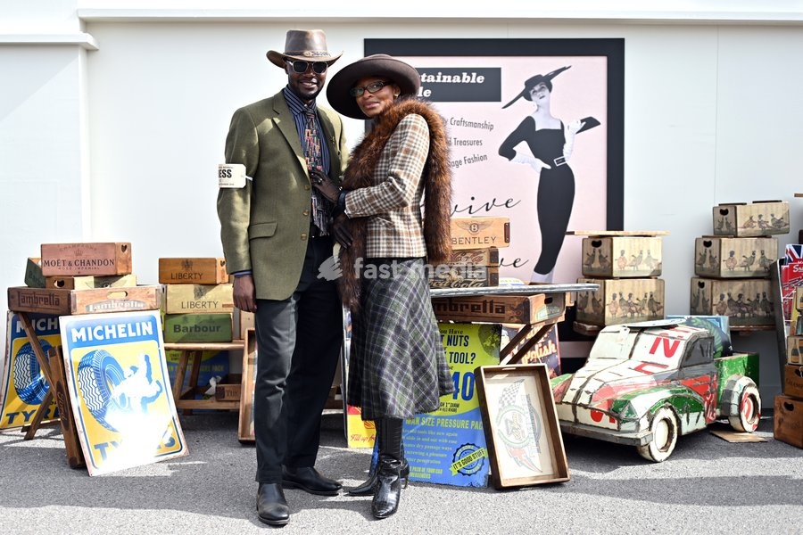 Racegoers in vintage fashion on day three of Goodwood Revival presented by Dunlop at the Goodwood Motor Circuit in Chichester, West Sussex. Picture date: Sunday September 20, 2026. This year's Revival is bringing La Dolce Vita to life with a track parade of over 300 Vespas and vintage scooters, a…