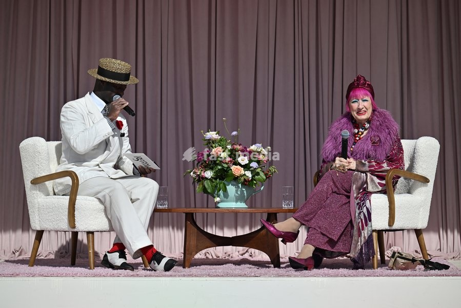 Dame Zandra Rhodes in conversation with Dandy Wellington on the Revival Style stage on day three of Goodwood Revival presented by Dunlop at the Goodwood Motor Circuit in Chichester, West Sussex. Picture date: Sunday September 20, 2026. This year's Revival is bringing La Dolce Vita to life with a…