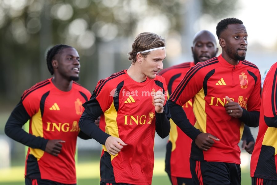 Belgium's Mika Godts and Belgium's Dodi Lukebakio pictured during a training session of the Red Devils, the Belgian national soccer team, at the national training center in Tubize, Monday 21 September 2026. The team is preparing for fixtures in the UEFA Nations League competition