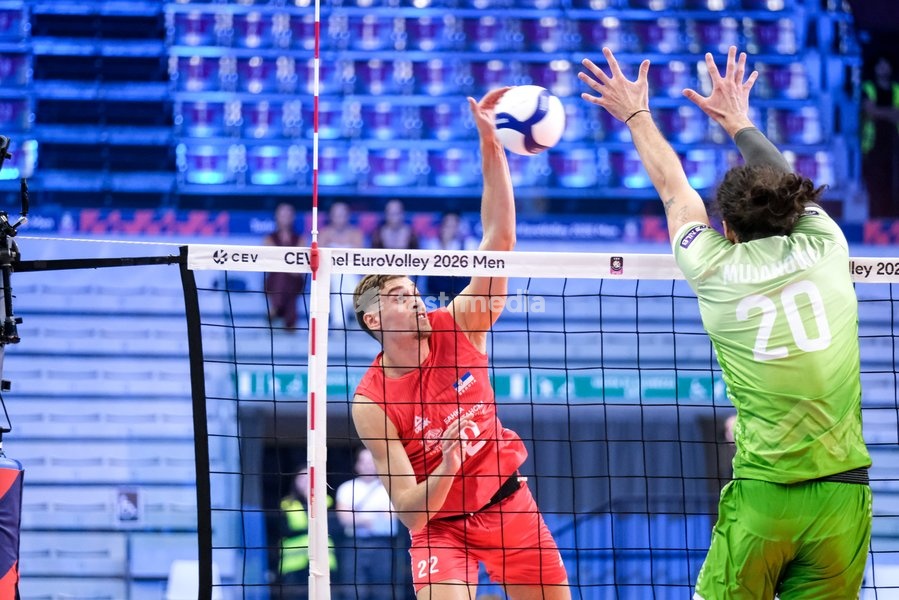 Veljko Mašulović of Serbia (L) and Nik Mujanović of Slovenia (R) during the Slovenia vs Serbia match at Final Eight of the CEV Enel EuroVolley 2026 Men at PalaVela in Turin, Italy, on September 21, 2026. Slovenia wins the match against Serbia with a score 3-0