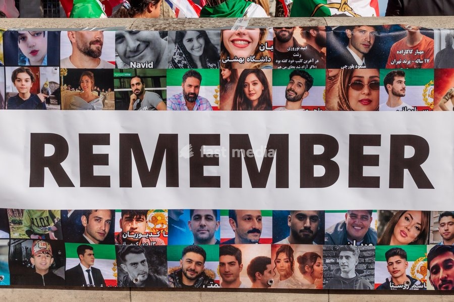 Richmond Terrace, London, UK. 20th Sept 2026. The Iranian diaspora and allies gather opposite Downing Street ahead of a powerful march to mark the fourth anniversary of the state kiling of Mahsa Amini, and to call for a regime change in Iran. A huge banner was stretched along a wall facing…