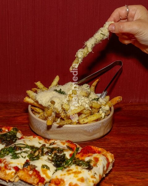 Truffle Parmesan Chips with 24-month aged parmesan and truffle mayonnaise at the Drag Bottoms Up Brunch at Clays Bar