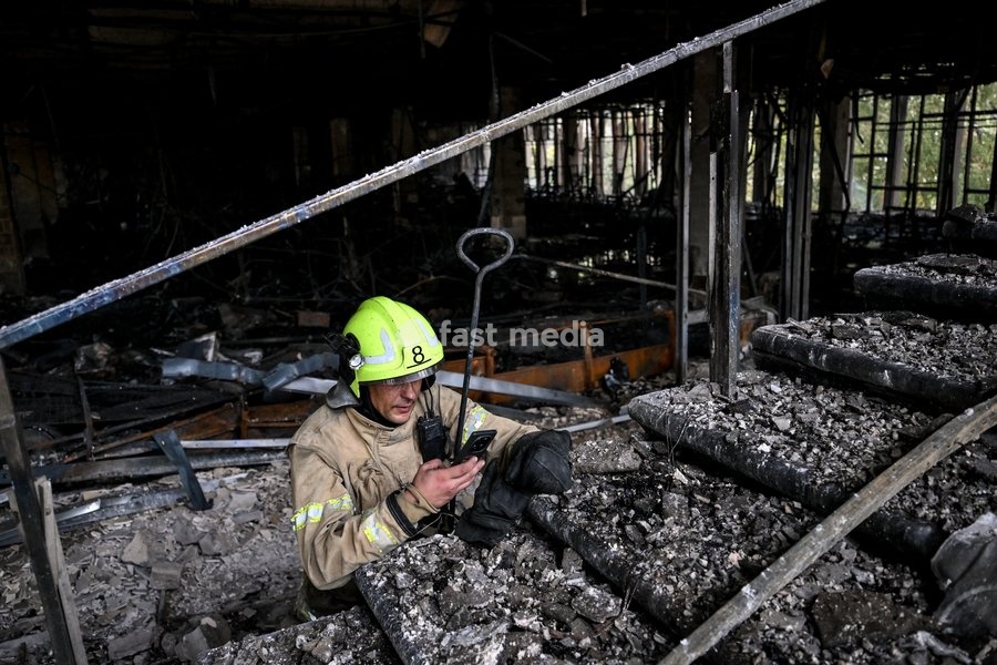 A State Emergency Service rescuer searches for hotspots during a response effort in the Intrade shopping centre, which burned down following a Russian drone attack, Zaporizhzhia, Ukraine, September 21, 2026. Overnight, Russian forces struck the city with strike UAVs and an FPV drone. The attack…
