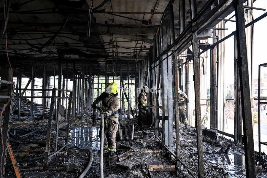State Emergency Service rescuers search for hotspots during a response effort in the Intrade shopping centre, which burned down following a Russian drone attack, Zaporizhzhia, Ukraine, September 21, 2026. Overnight, Russian forces struck the city with strike UAVs and an FPV drone. The attack…