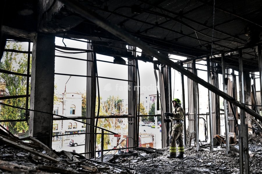 A State Emergency Service rescuer searches for hotspots during a response effort in the Intrade shopping centre, which burned down following a Russian drone attack, Zaporizhzhia, Ukraine, September 21, 2026. Overnight, Russian forces struck the city with strike UAVs and an FPV drone. The attack…