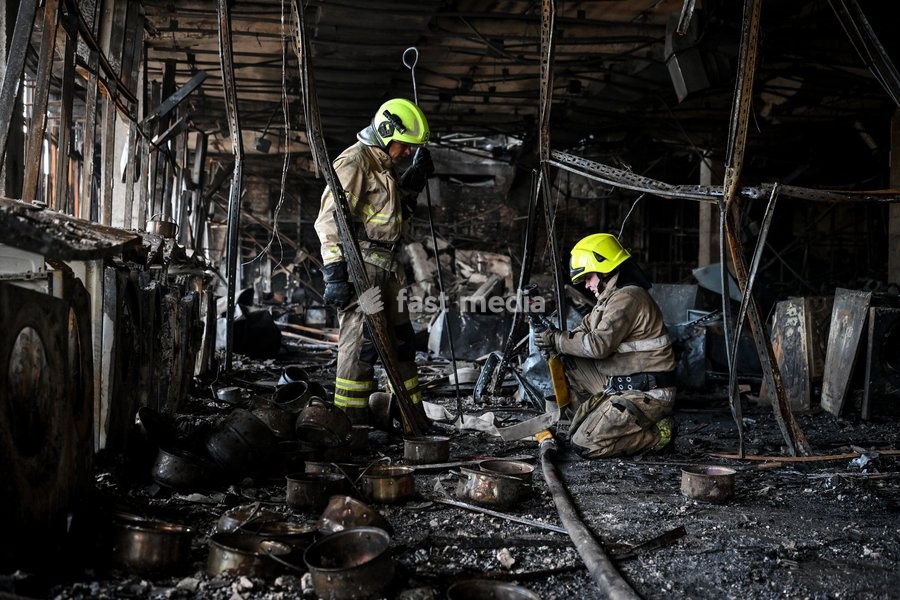 State Emergency Service rescuers search for hotspots during a response effort in the Intrade shopping centre, which burned down following a Russian drone attack, Zaporizhzhia, Ukraine, September 21, 2026. Overnight, Russian forces struck the city with strike UAVs and an FPV drone. The attack…