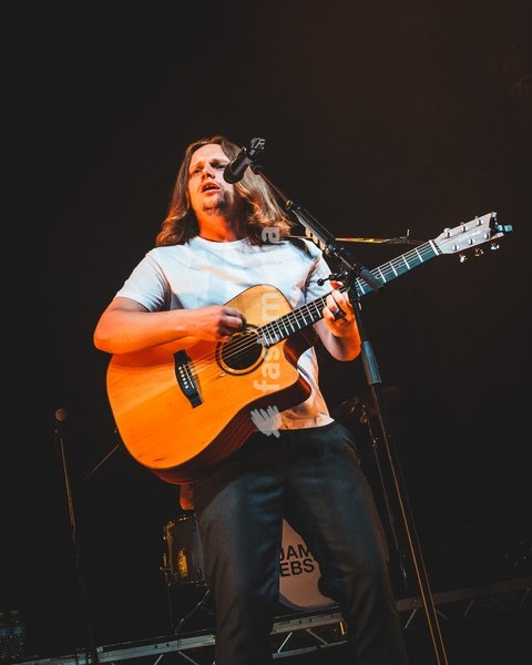 Jamie Webster performing live at O2 Academy Glasgow. The acclaimed Liverpudlian singer-songwriter brought his signature rock and roll sound to the renowned venue. Known for his passionate vocal delivery and rousing anthems, Webster delivered a captivating headline set blending foot-stomping indie…