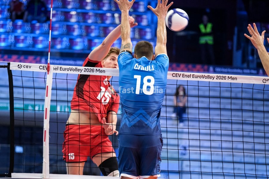 Basil Dermaux of Belgium (L) and Klemen Cebulj of Slovenia (R) during the Belgium vs Slovenia match at Quarter Final of the CEV Enel EuroVolley 2026 Men at PalaVela in Turin, Italy, on September 23, 2026. Belgium losts the match against Slovenia with a score 1-3