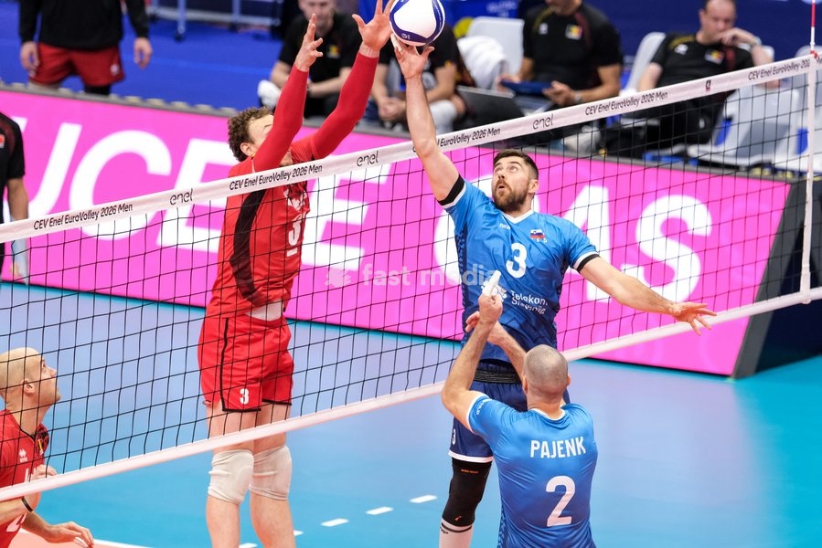 Sam Deroo of Belgium (L) and Uroš Planinšič of Slovenia (R) during the Belgium vs Slovenia match at Quarter Final of the CEV Enel EuroVolley 2026 Men at PalaVela in Turin, Italy, on September 23, 2026. Belgium losts the match against Slovenia with a score 1-3