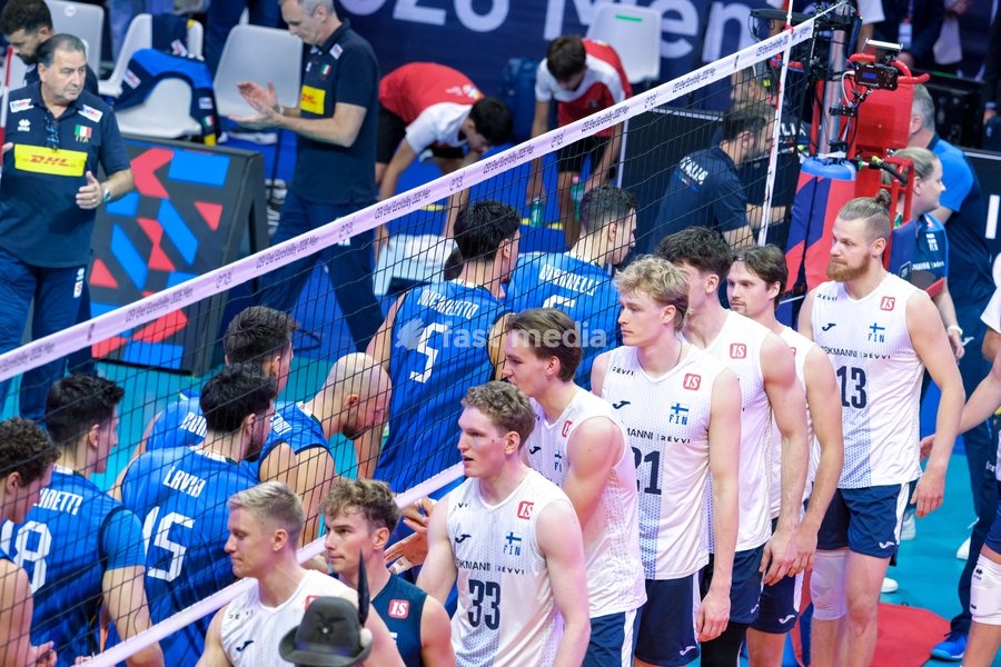 Italy players (L) and Finland players (R) during the Italy vs Finland match at Quarter Final of the CEV Enel EuroVolley 2026 Men at PalaVela in Turin, Italy, on September 23, 2026. Italy loses the match against Finland with a score 2-3