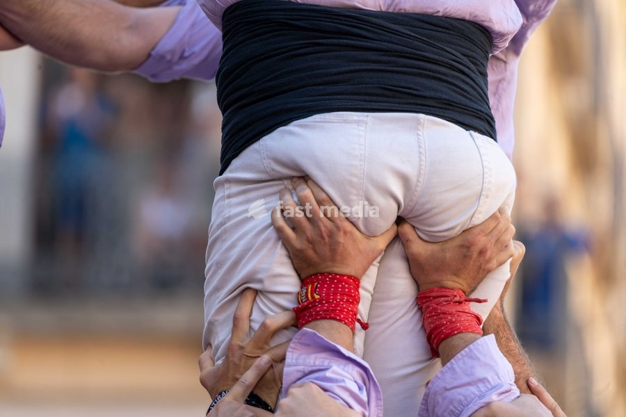 A member of Castellers de Terrassa during the human towers performance at the traditional La Mercè festival celebrations, September 27, 2026, Plaça Sant Jaume, Barcelona, Catalonia