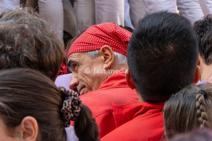 A member of Colla Jove dels Xiquets de Valls during the human towers performance at the traditional La Mercè festival celebrations, September 27, 2026, Plaça Sant Jaume, Barcelona, Catalonia