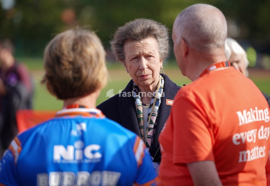 YORK, ENGLAND - SEPTEMBER 28: Princess Anne, Princess Royal listens to MND Association staff during the 7 in 7: The Grand Finale at the University of York Athletics Track on September 28, 2026 in York, England. Sir Kevin Sinfield is running an ultra marathon every day for seven days to raise money…