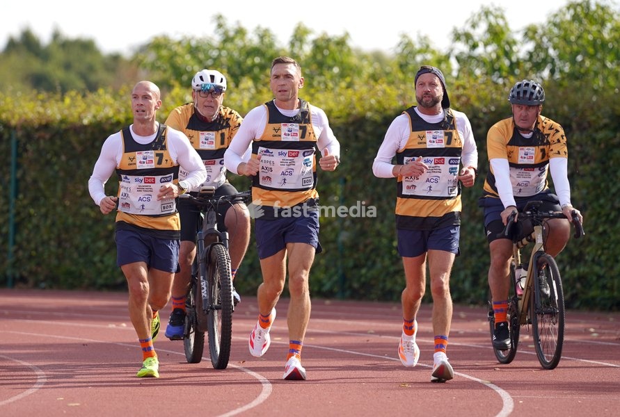 YORK, ENGLAND - SEPTEMBER 28: Sir Kevin Sinfield (C) arrives at the end of his morning’s running block during the 7 in 7: The Grand Finale at the University of York Athletics Track on September 28, 2026 in York, England. Sir Kevin Sinfield is running an ultra marathon every day for seven days to…