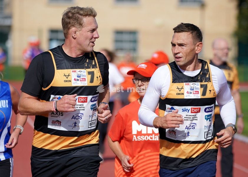 YORK, ENGLAND - SEPTEMBER 28: Lewis Moody and Sir Kevin Sinfield run around the track with MND supporters during the 7 in 7: The Grand Finale at the University of York Athletics Track on September 28, 2026 in York, England. Sir Kevin Sinfield is running an ultra marathon every day for seven days to…