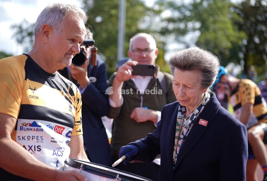 YORK, ENGLAND - SEPTEMBER 28: Princess Anne, Princess Royal bangs a drum to start the next stage of the race during the 7 in 7: The Grand Finale at the University of York Athletics Track on September 28, 2026 in York, England. Sir Kevin Sinfield is running an ultra marathon every day for seven days…
