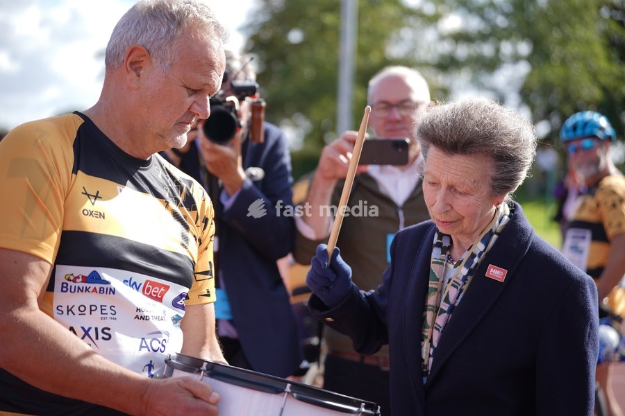 YORK, ENGLAND - SEPTEMBER 28: Princess Anne, Princess Royal bangs a drum to start the next stage of the race during the 7 in 7: The Grand Finale at the University of York Athletics Track on September 28, 2026 in York, England. Sir Kevin Sinfield is running an ultra marathon every day for seven days…