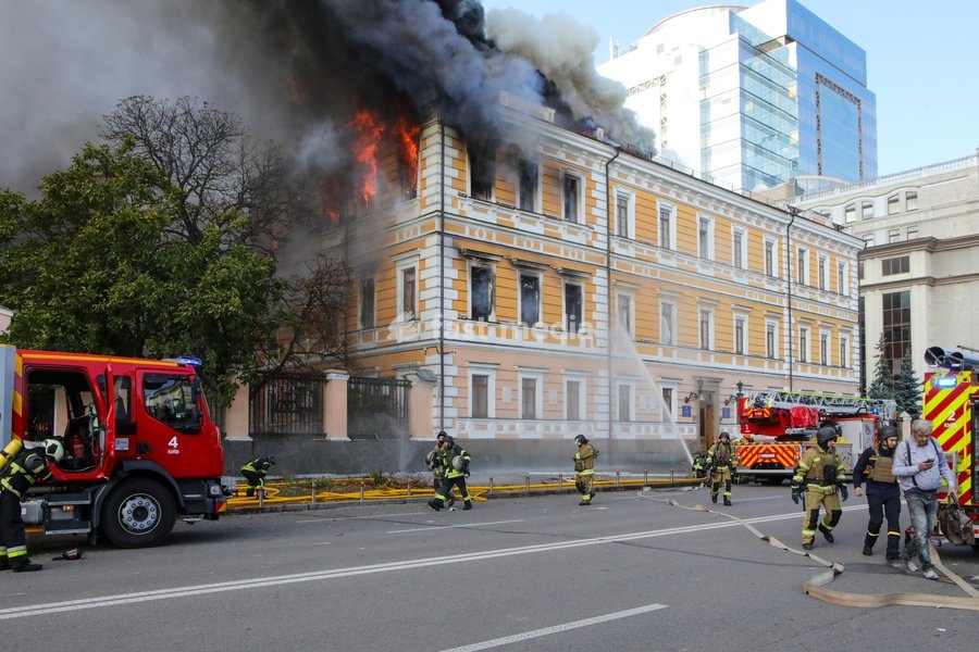 Rescuers work to extinguish a fire at the National Academy of Sciences building, which is engulfed in flames after being hit by a Russian drone, Kyiv, Ukraine, September 28, 2026. One person was killed, and three others were injured in the attack