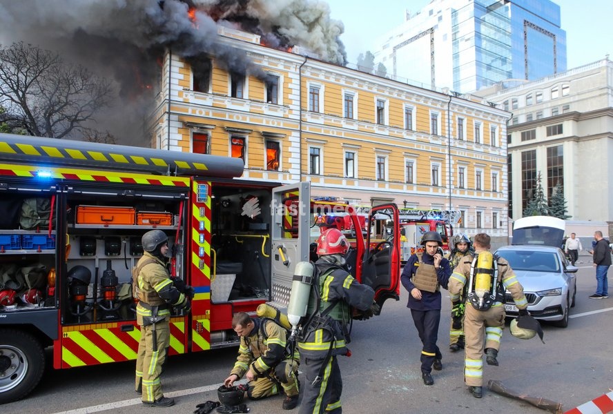 Rescuers work to extinguish a fire at the National Academy of Sciences building, which is engulfed in flames after being hit by a Russian drone, Kyiv, Ukraine, September 28, 2026. One person was killed, and three others were injured in the attack