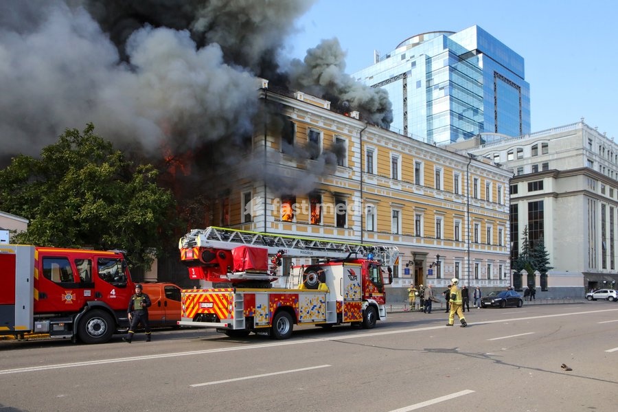 Rescuers work to extinguish a fire at the National Academy of Sciences building, which is engulfed in flames after being hit by a Russian drone, Kyiv, Ukraine, September 28, 2026. One person was killed, and three others were injured in the attack