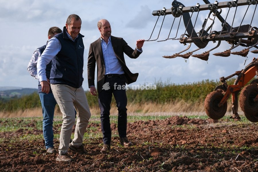 Britain's Prince William touches a farming machine as he meets Harry Davies, the incoming tenant of the Duchy of Cornwall's first regenerative Farm Business Tenancy, during a visit to examine the role of regenerative farming in climate resilience in Hereford, Britain, October 1, 2026