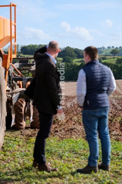 Britain's Prince William looks towards a field as he meets Harry Davies, the incoming tenant of the Duchy of Cornwall's first regenerative Farm Business Tenancy, during a visit to examine the role of regenerative farming in climate resilience in Hereford, Britain, October 1, 2026
