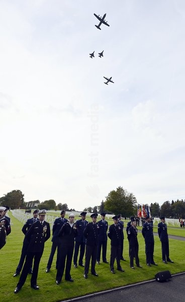 Two F-16 fighter jets and C-130 transport aircraft are flying over the ceremony during a royal visit to the World War II Commemoration at the American Military Cemetery in Henri-Chapelle, Plombieres, on Friday 2 October 2026. The ceremony pays tribute to the American veterans in attendance and to…