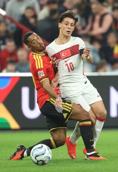 Belgium's Youri Tielemans and Turkey' Arda Guler fight for the ball during pictured during a soccer game between Belgian national team Red Devils and Turkey, on Friday 2 October 2026 in Liege, the third game of the UEFA Nations League group stage