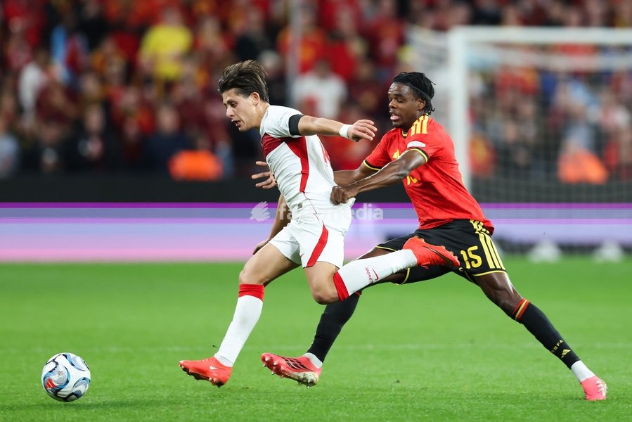 Turkey' Arda Guler and Belgium's Nathan Ngoy pictured during a soccer game between Belgian national team Red Devils and Turkey, on Friday 2 October 2026 in Liege, the third game of the UEFA Nations League group stage